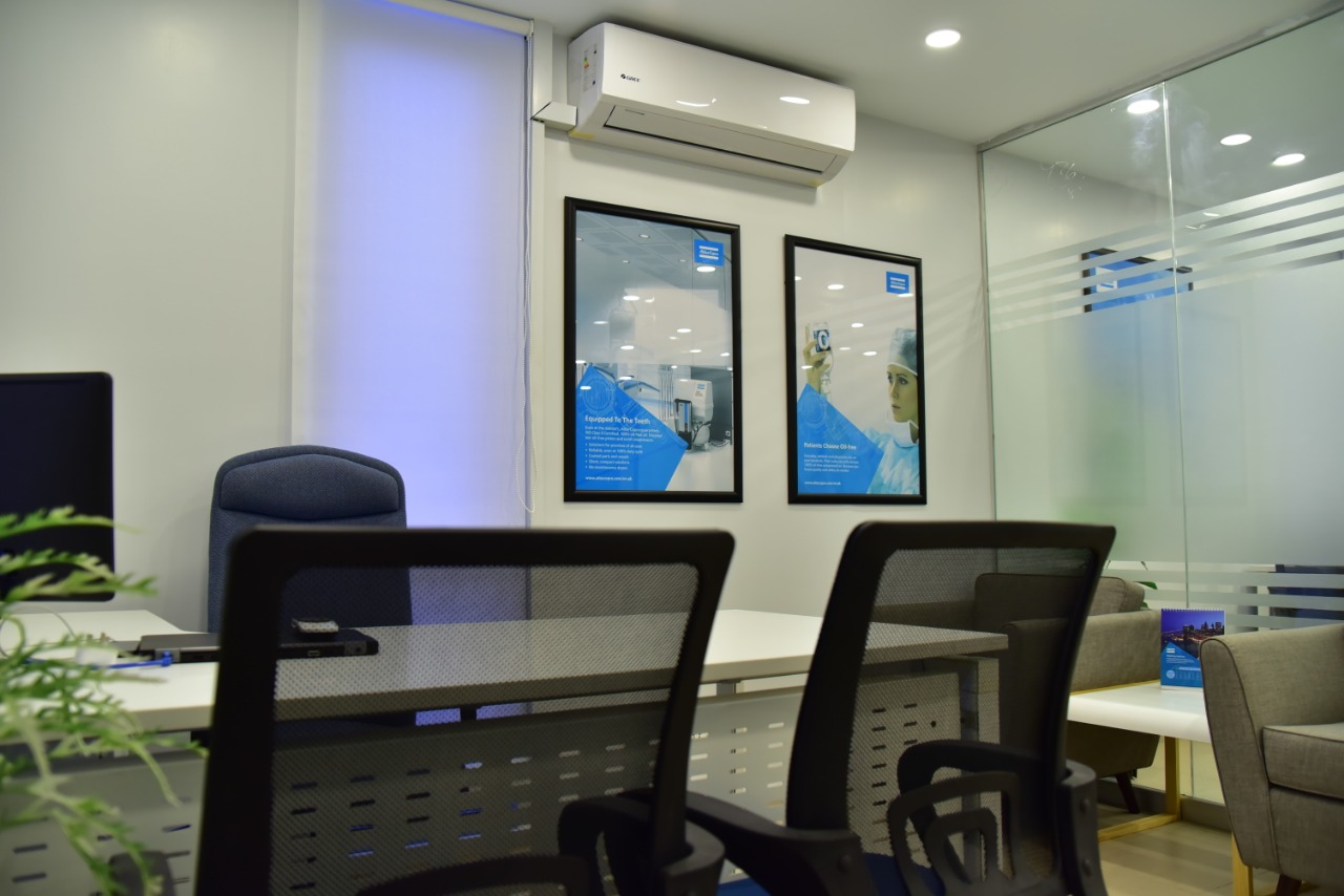Workstation cabin with framed brand imagery