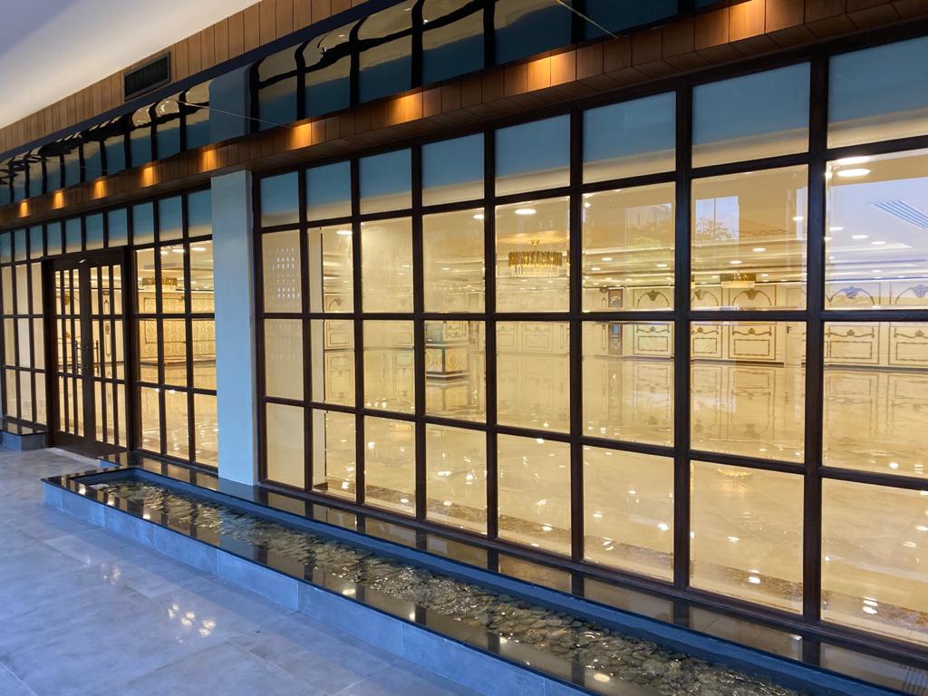 Glass facade with a water-court entrance into the gold ballroom