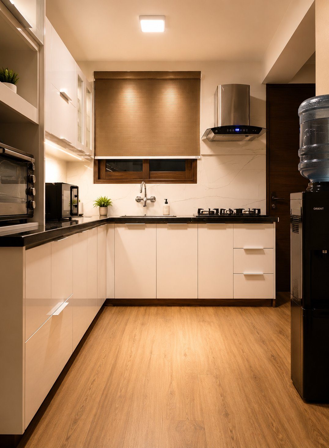 White and wood galley kitchen with black countertops