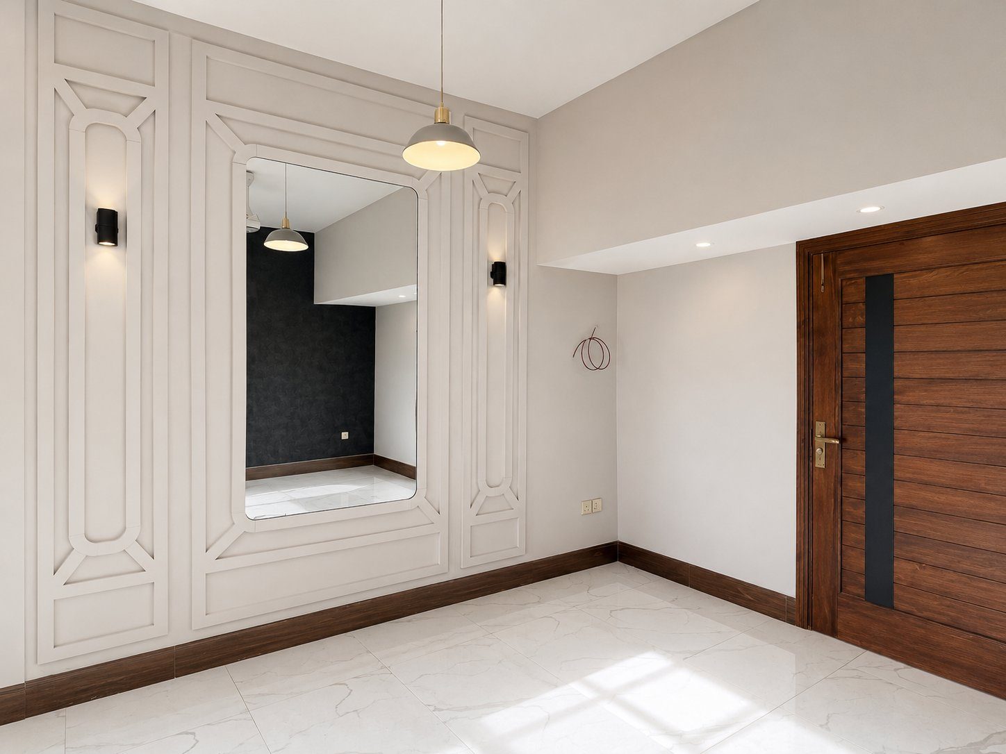 Entry foyer with framed mirror, wall panelling and pendant light